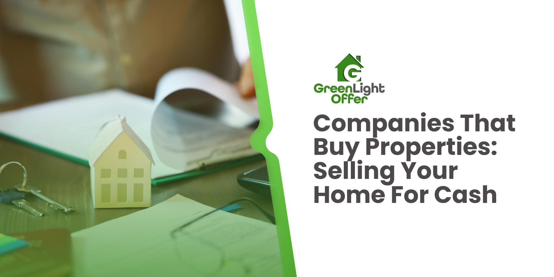 Model house figurine and keys on a desk with documents, representing cash home sales by Greenlight Offer.